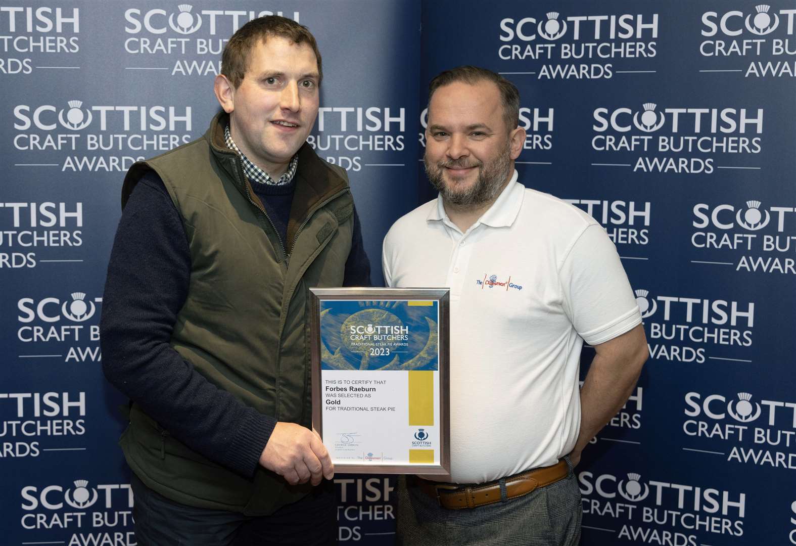 Gary Raeburn (left), from Forbes Raeburn Butchers, pictured with his Gold Award in the Traditional Steak Pie Awards with Simon Coles from sponsors Dalesman. Picture: Graeme Hart.