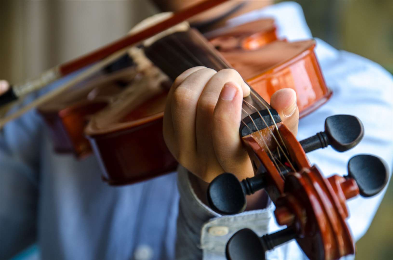 The cost of learning a musical instrument in Scottish schools will be waived.