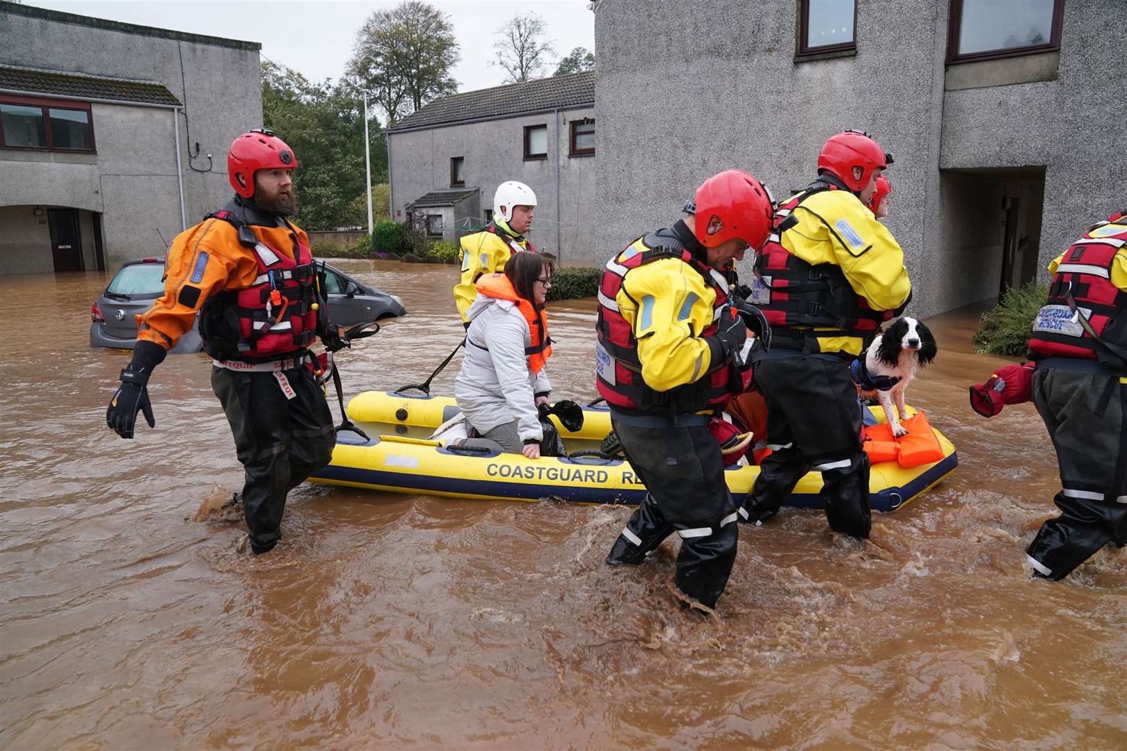 Members of the emergency services had to help residents to safety in Brechin last week during Storm Babet (PA)