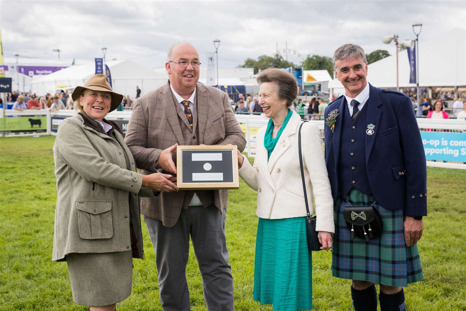 HRH Princess Anne and RHASS Chairman Jim Warnock (far right) presenting the Sir William Young Award to 2023 winners Dochy Ormiston (MVO) and Sylvia Ormiston (MVO) (left and far left).