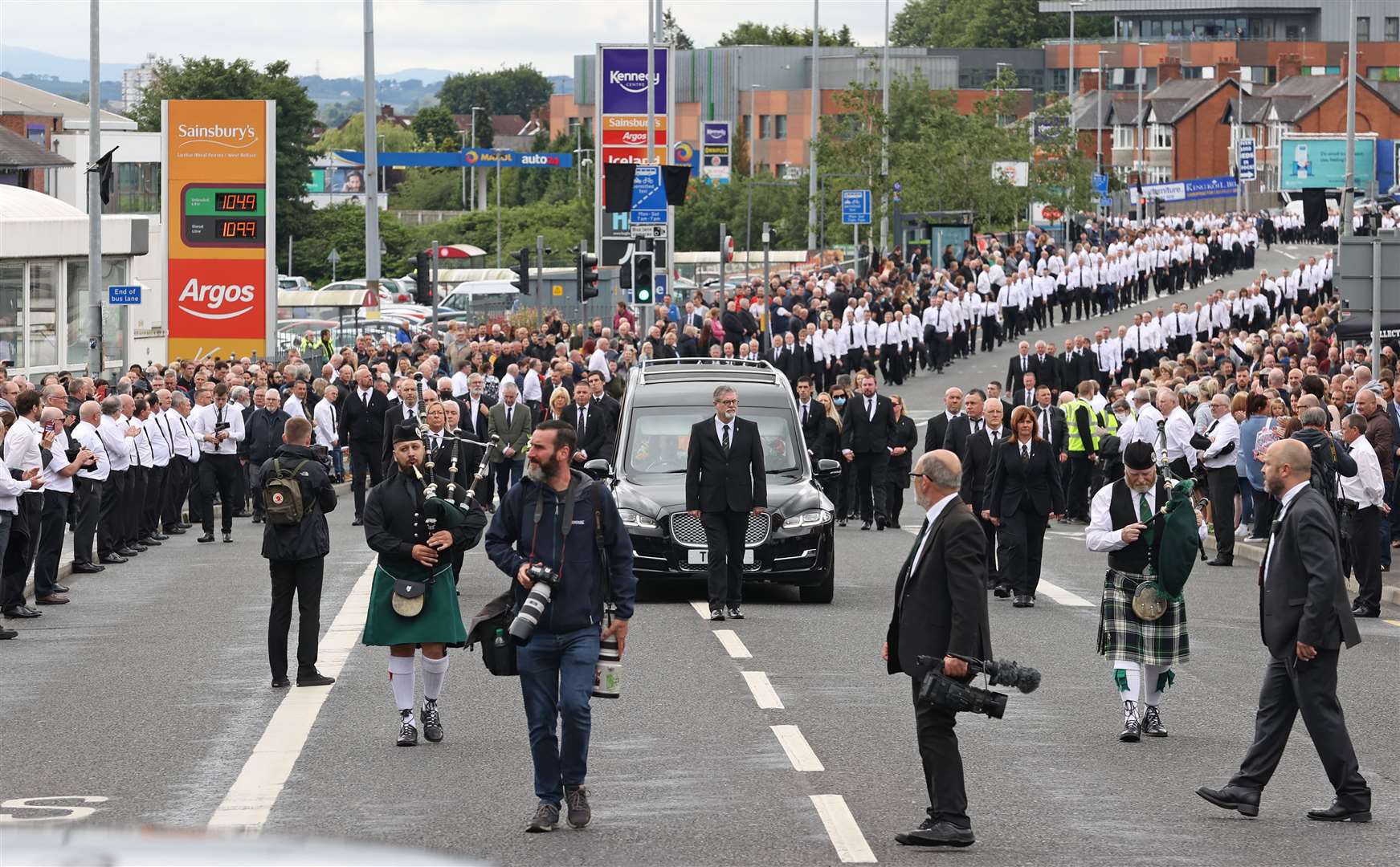 The funeral procession of senior Irish Republican and former leading IRA figure Bobby Storey following the funeral at St Agnes’ Church in west Belfast (PA)