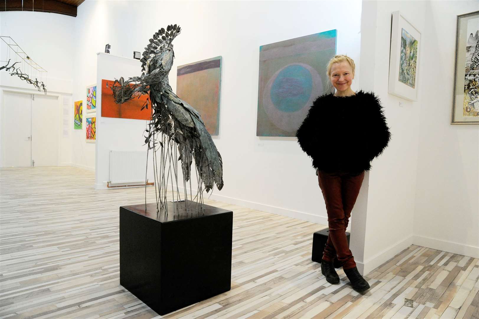 Karen Curran alongside a piece of her own artwork. Picture: Eric Cormack