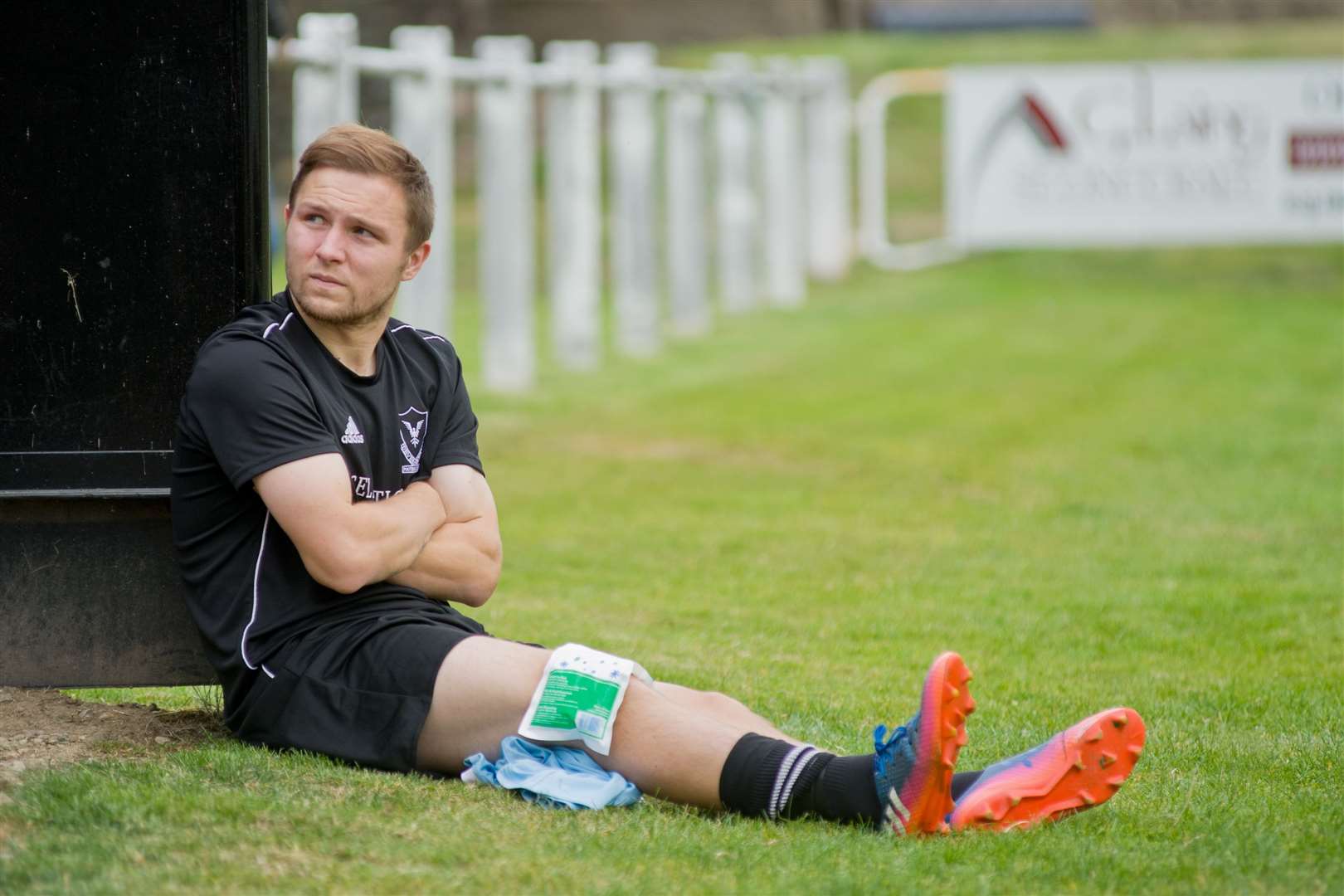 The start of 17 months of misery for Dane Ballard as he lies injured on the sidelines at Rothes in September 2018.