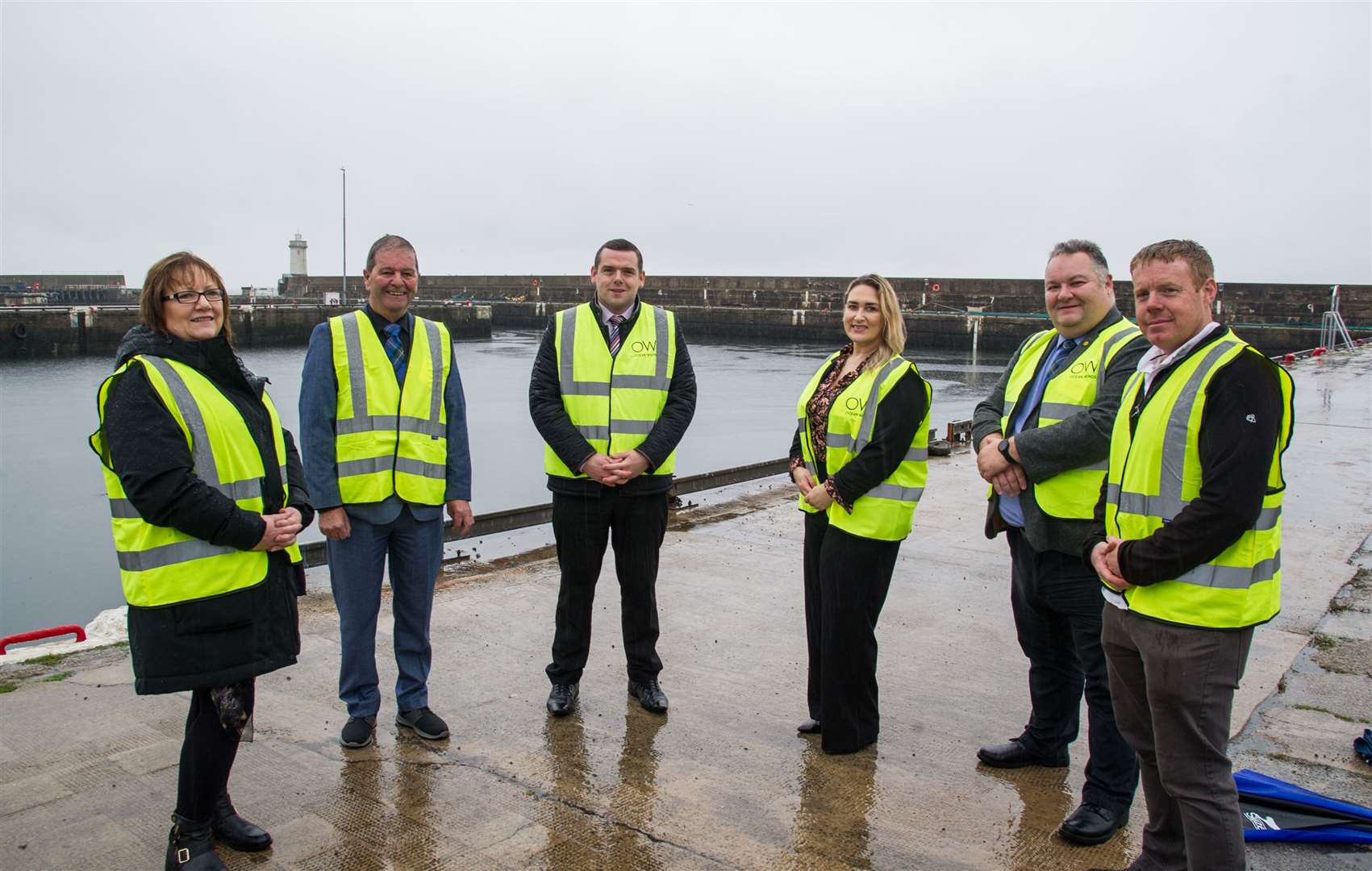 Examining the site at pier 3 which will host the wind farm O&M base are (from left) Councillor Sonya Warren, Councillor Gordon Cowie, Moray MP Douglas Ross, Banffshire anPicture: Becky Saunderson