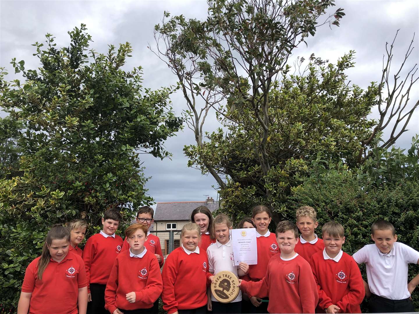 Whitehills Primary school pupils with their gold award from the Woodland Trust.