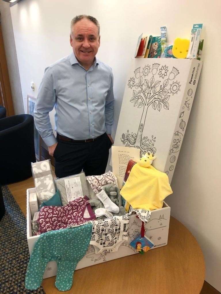 Richard Lochhead with one of the Baby Boxes.