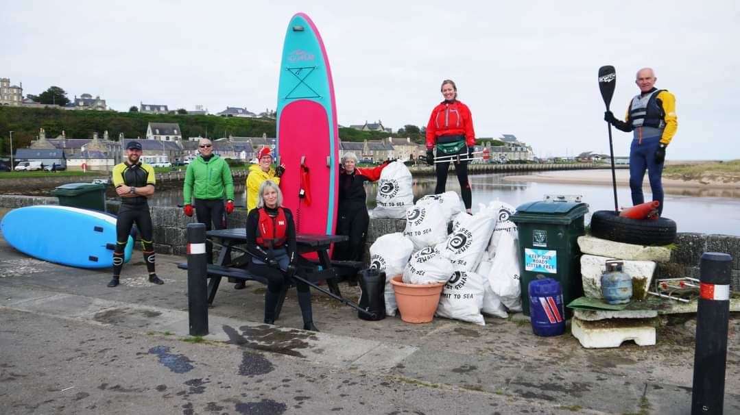 Moray Stand-up Paddleboarding Club members after their River Lossie litter pick on Sunday.