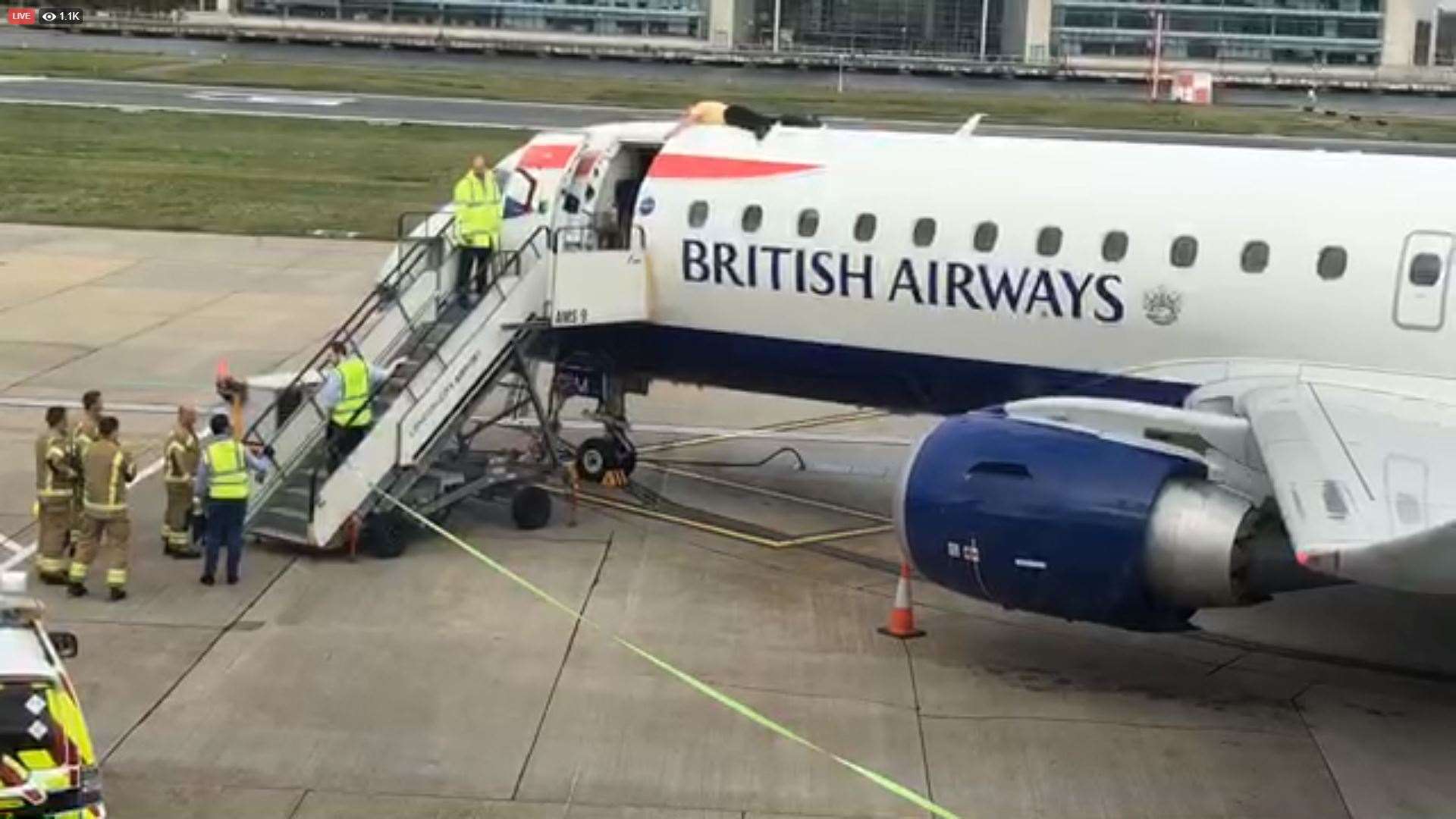 Screengrab taken from a video on Extinction Rebellion’s Facebook page of James Brown lying on top of a British Airways plane at London City Airport (Extinction Rebellion/PA)