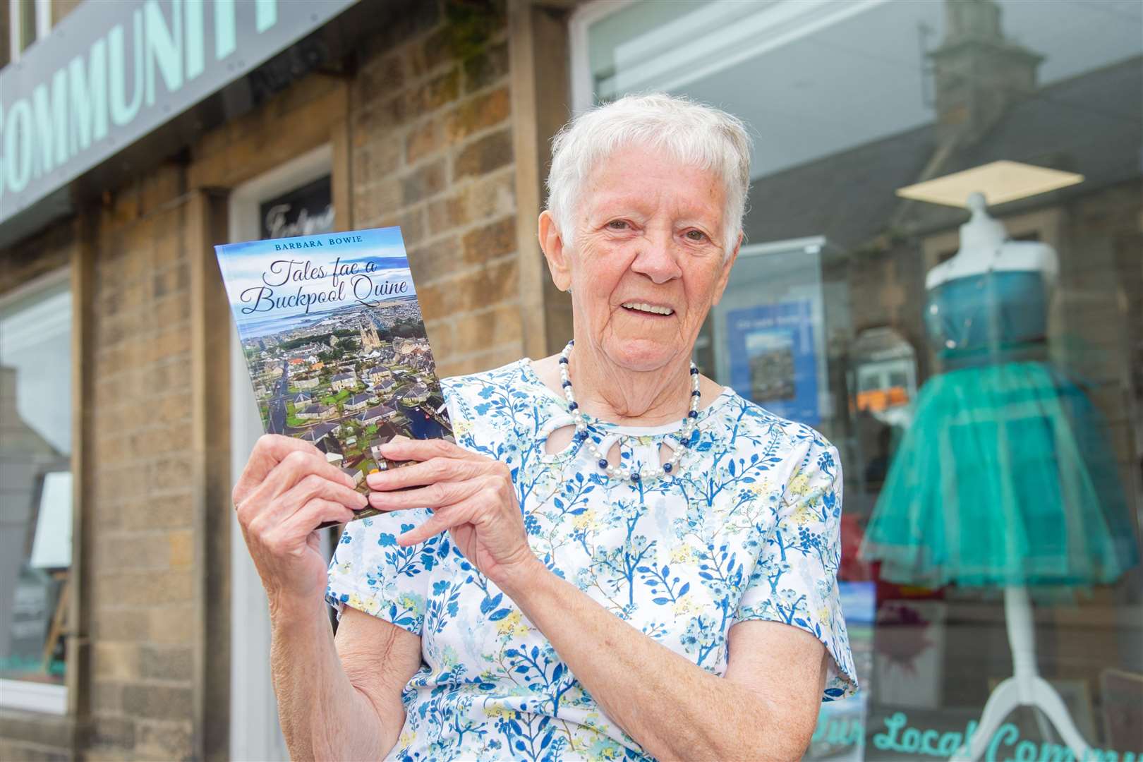 Barbara Bowie with a copy of her debut book Tales fae a Buckpool Quine. Picture: Daniel Forsyth