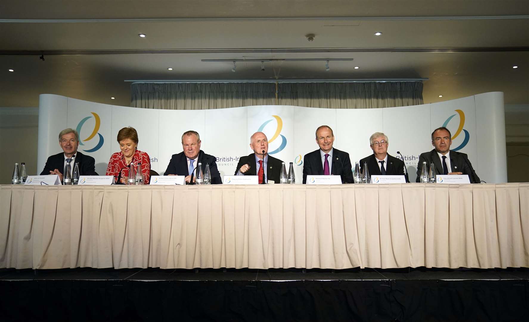 From left to right, Chief Minister of Jersey John Le Fondre, Scottish First Minister Nicola Sturgeon, Minister of State for Northern Ireland Conor Burns, Chief minister of Guernsey Peter Ferbrache, Taoiseach Michael Martin, First Minister of Wales Mark Drakeford and Chief Minister of the Isle of Man Alfred Cannon in Guernsey (Andrew Matthews/PA)