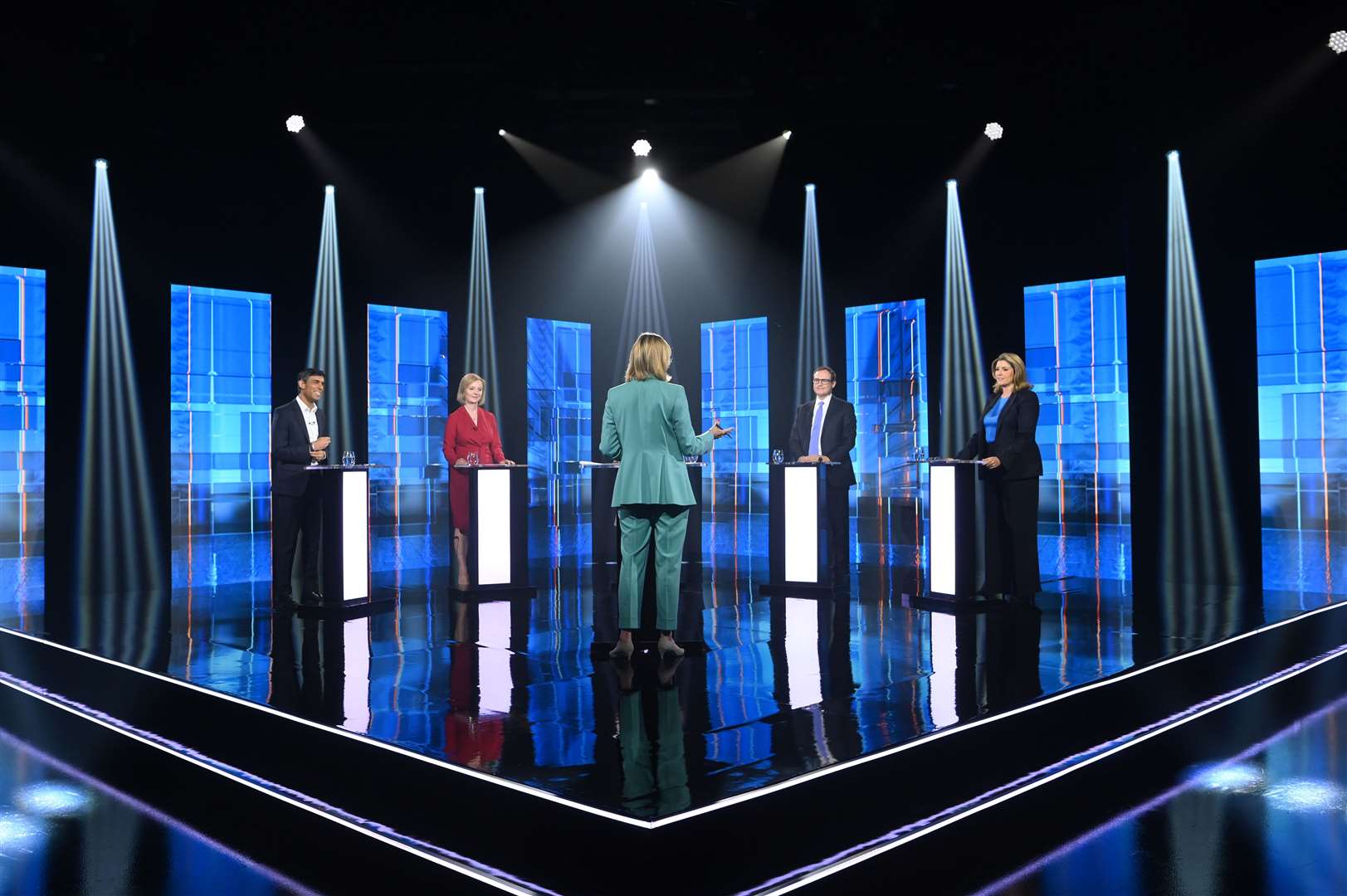 The Tory leadership candidates and presenter Julie Etchingham on stage in the ITV televised debate (Jonathan Hordle/ITV/PA)