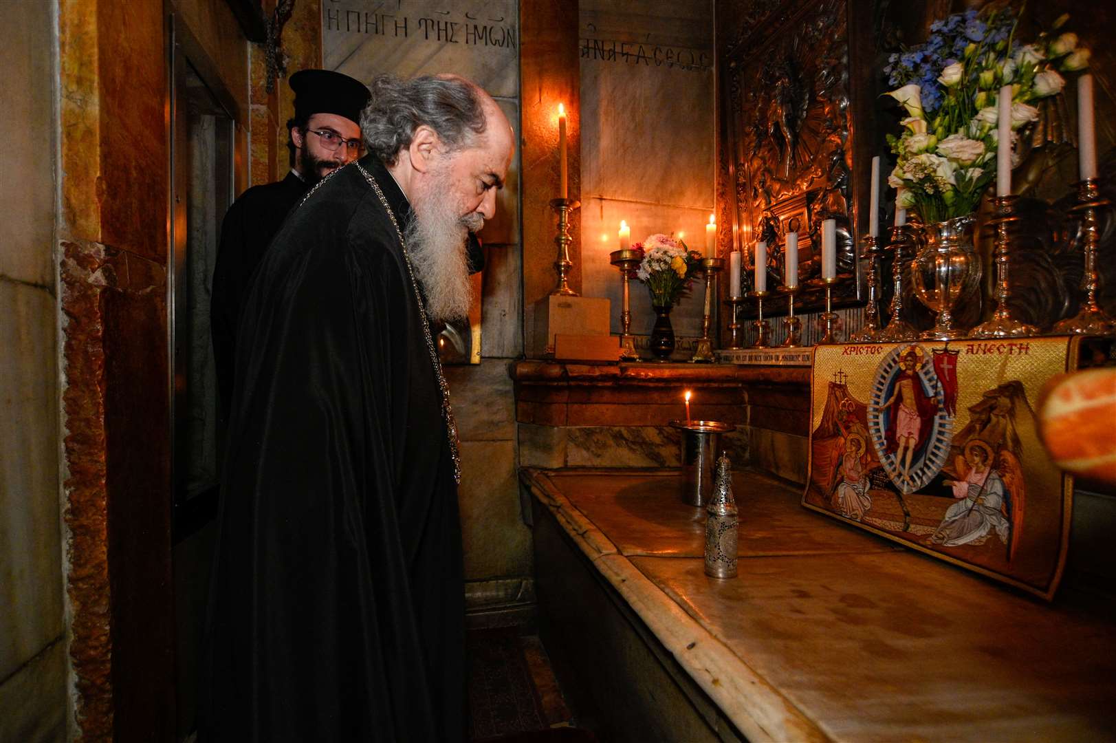The Patriarch of Jerusalem, His Beatitude Patriarch Theophilos III, with the chrism oil in a silver urn at the Tomb of Jesus in Jerusalem (Patriarchate of Jerusalem/Buckingham Palace/PA)