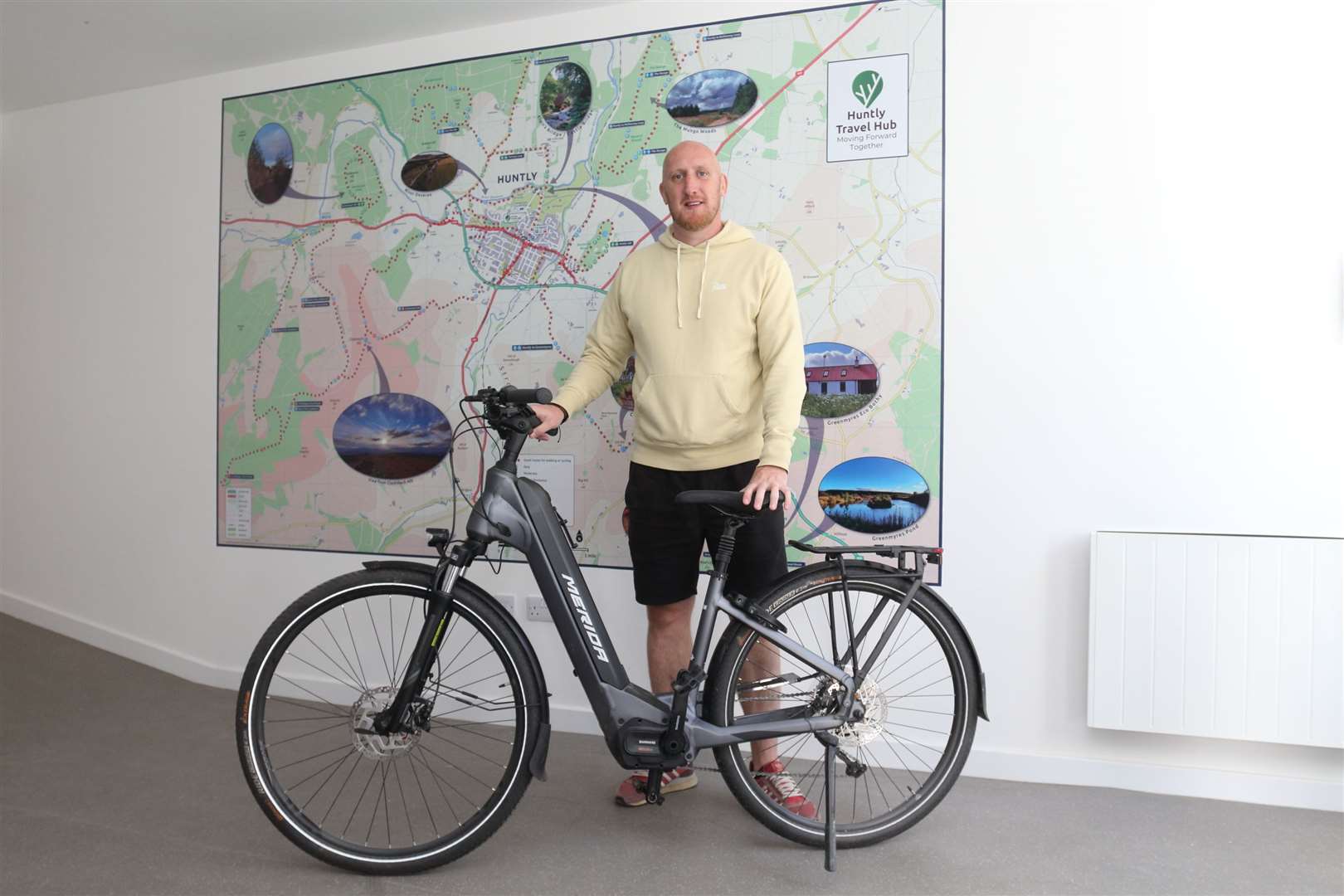 Stuart Masson, manager at Huntly Travel Hub, shows off the service's new map of walking and cycling routes in Huntly during Hairst...Picture: David Porter