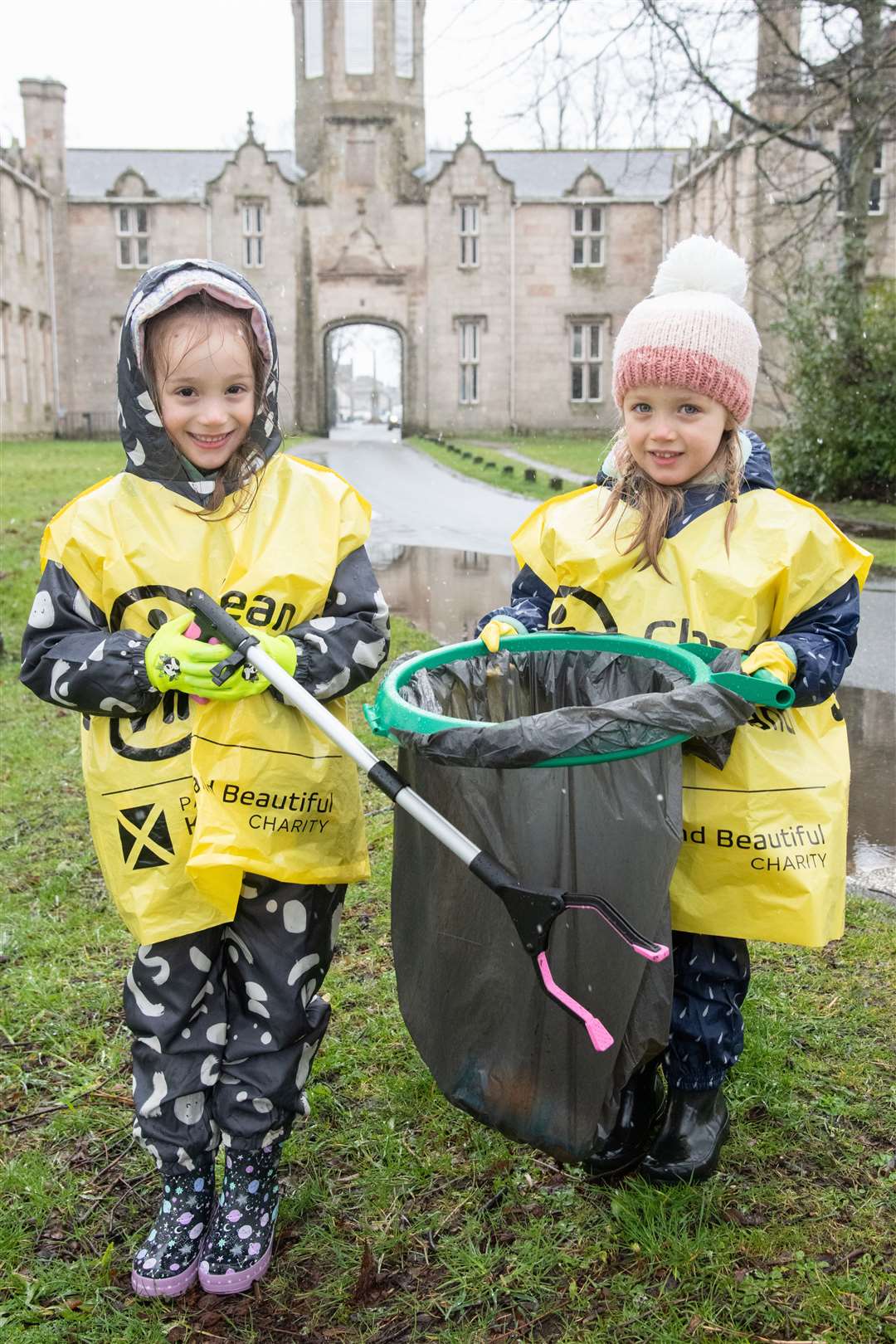 Joining the community litter pick in Huntly, Isla and Callie Fowler show off their hard work…Picture: Daniel Forsyth.