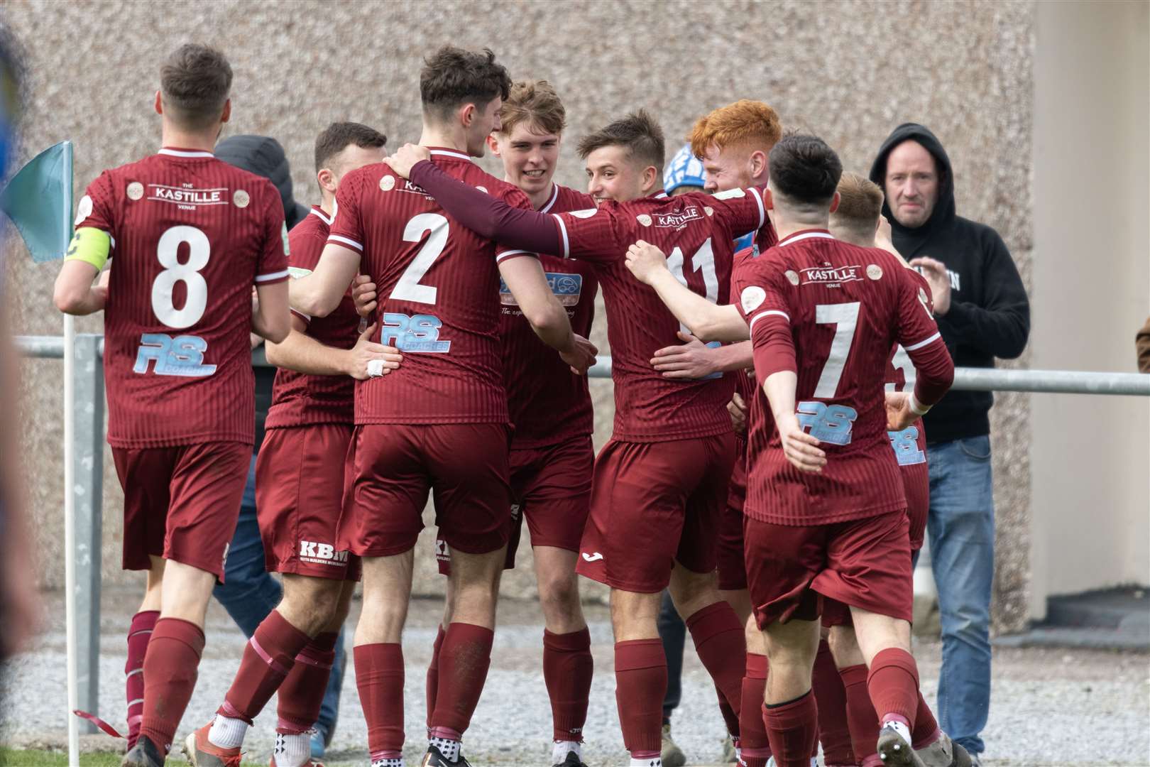 Celebration time for the Maroons after Lewis Coull's opener in the 1-1 draw with Huntly. Picture: Beth Taylor.