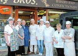Bill and Douglas Murray with some of their grocers and bakery staff outside the family business which closed on Saturday after almost 120 years in Main Street, Gardenstown.
