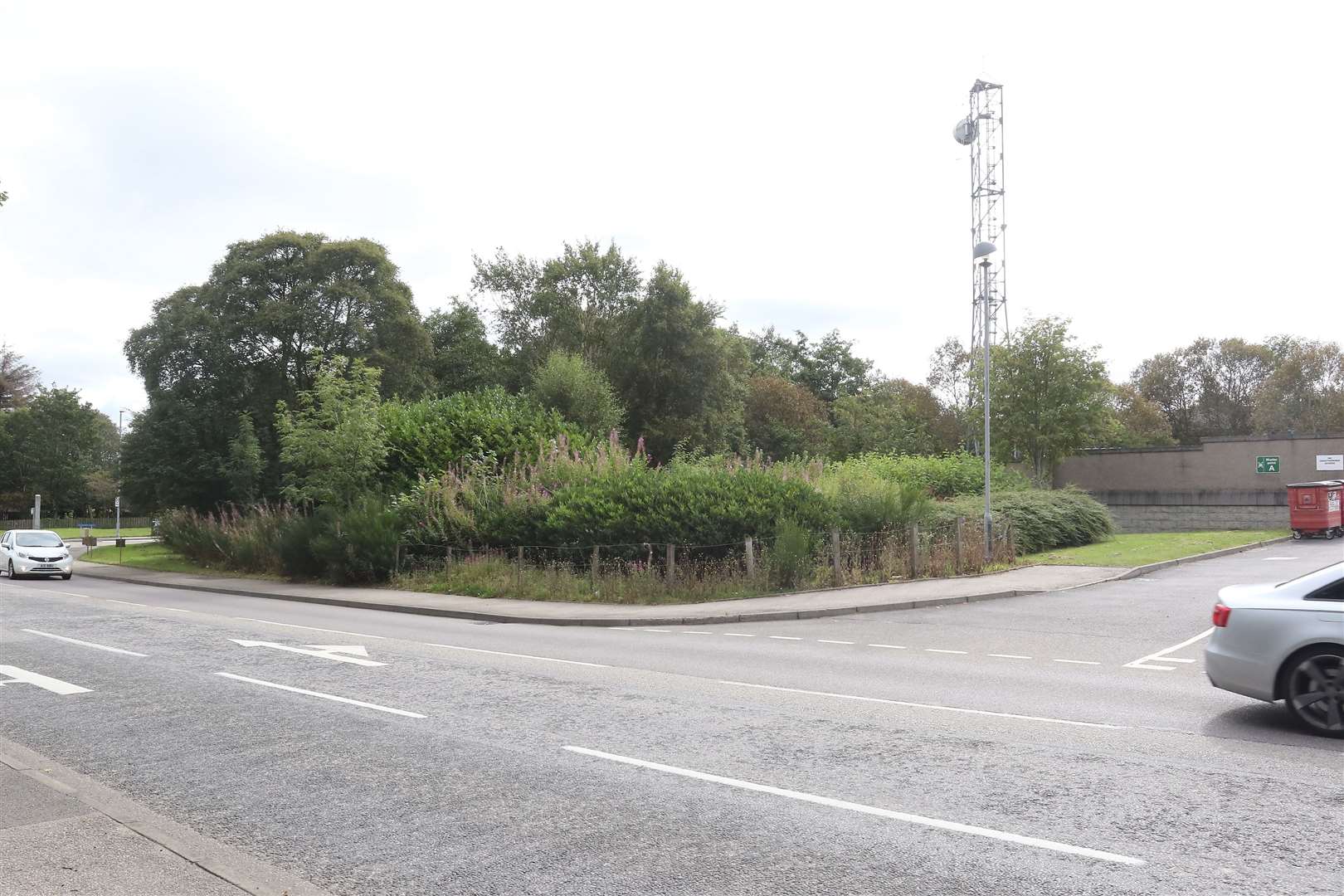 The woodland site next to Inverurie Police station where a development of flats is planned.