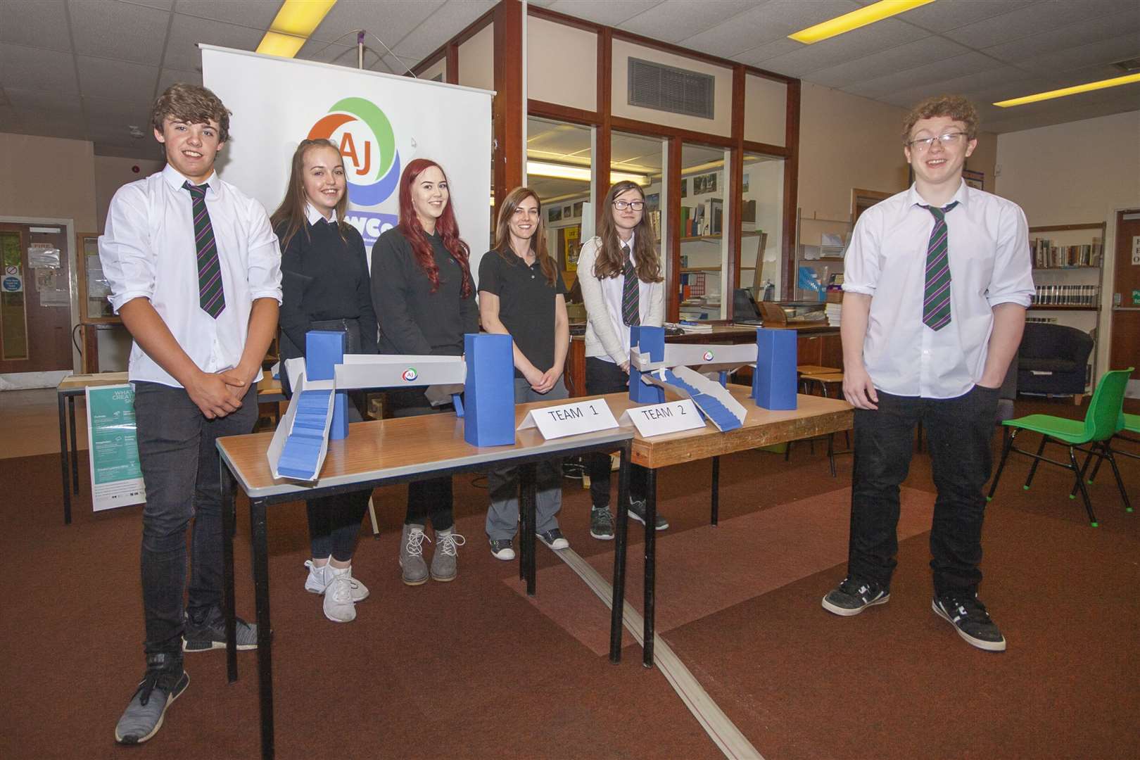 Sponsor of the secondary school teacher award, AJ Engineering, regularly works with schools including this previous project with pupils from Forres Academy. Centre are former graduate apprentice Laura Mair and quality manager Jazmin Kellas.