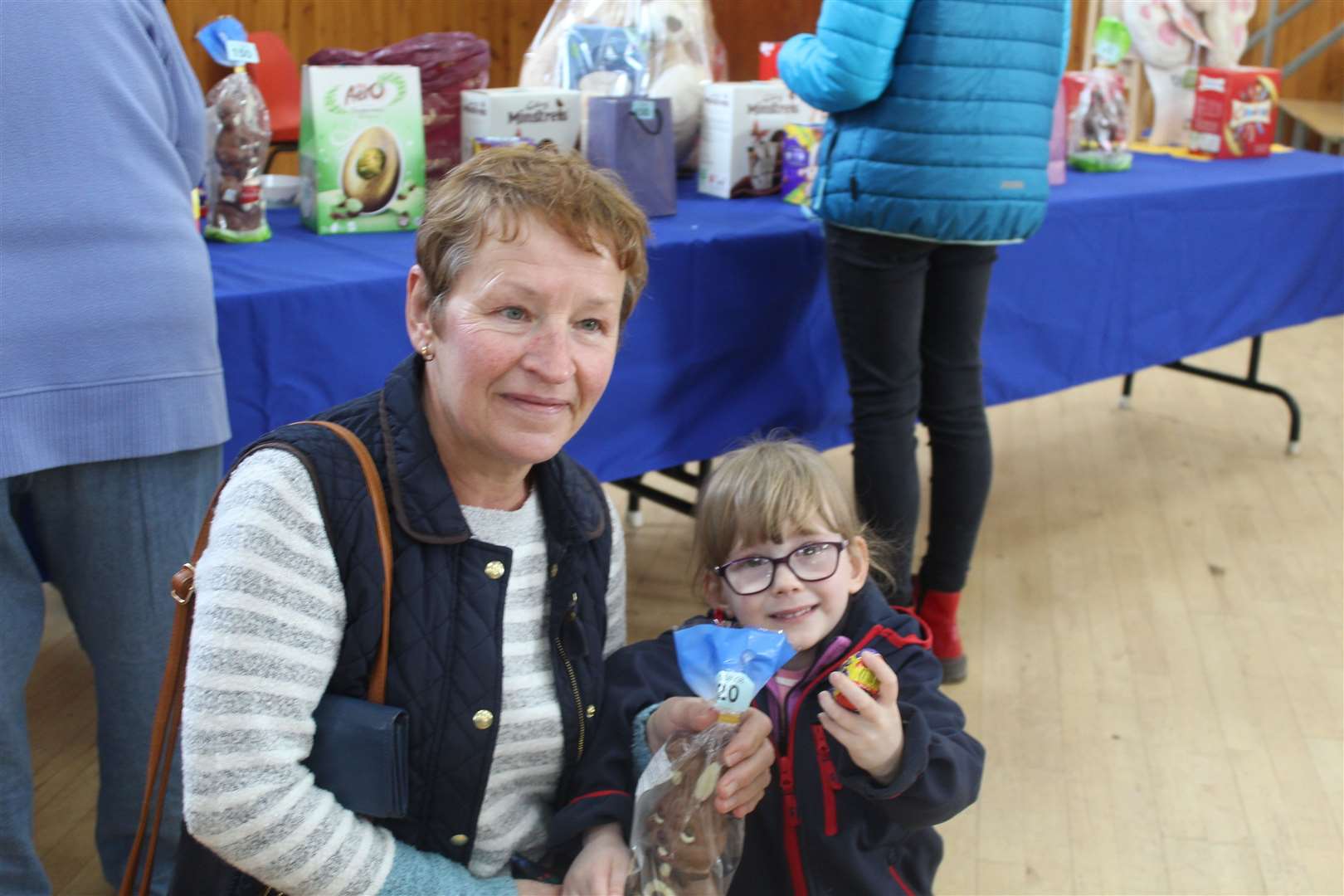 Wee Holly Reid with Irene Reid struck lucky at the raffle stall going home with a big chocolate bunny and easter eggs at Saturday's Cats Protection sale at Alford hall. Picture: Griselda McGregor