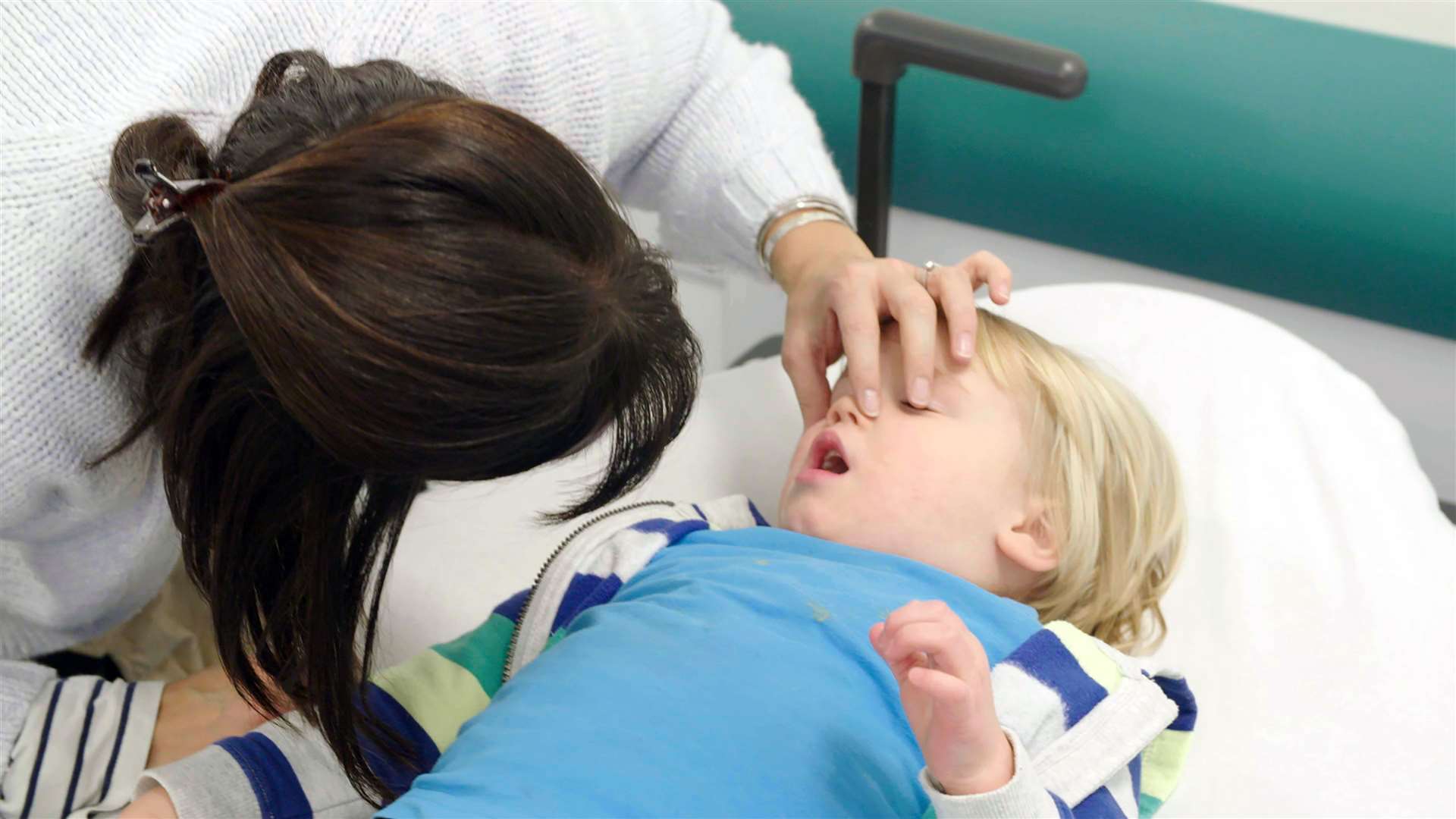 Mum, Penny, prepares to find out what's stuck up her son Ossian's nose at the Royal Aberdeen Children's Hospital.