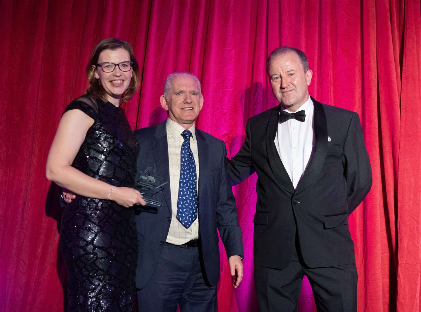 Debbie Main and Paul Hughes (right) with Frank Reid, Managing Director for Robertson.Picture: Beth Taylor