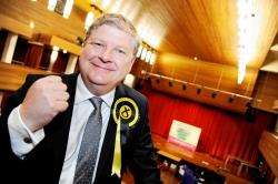 Angus Robertson celebrates his victory. Photo by Daniel Forsyth.