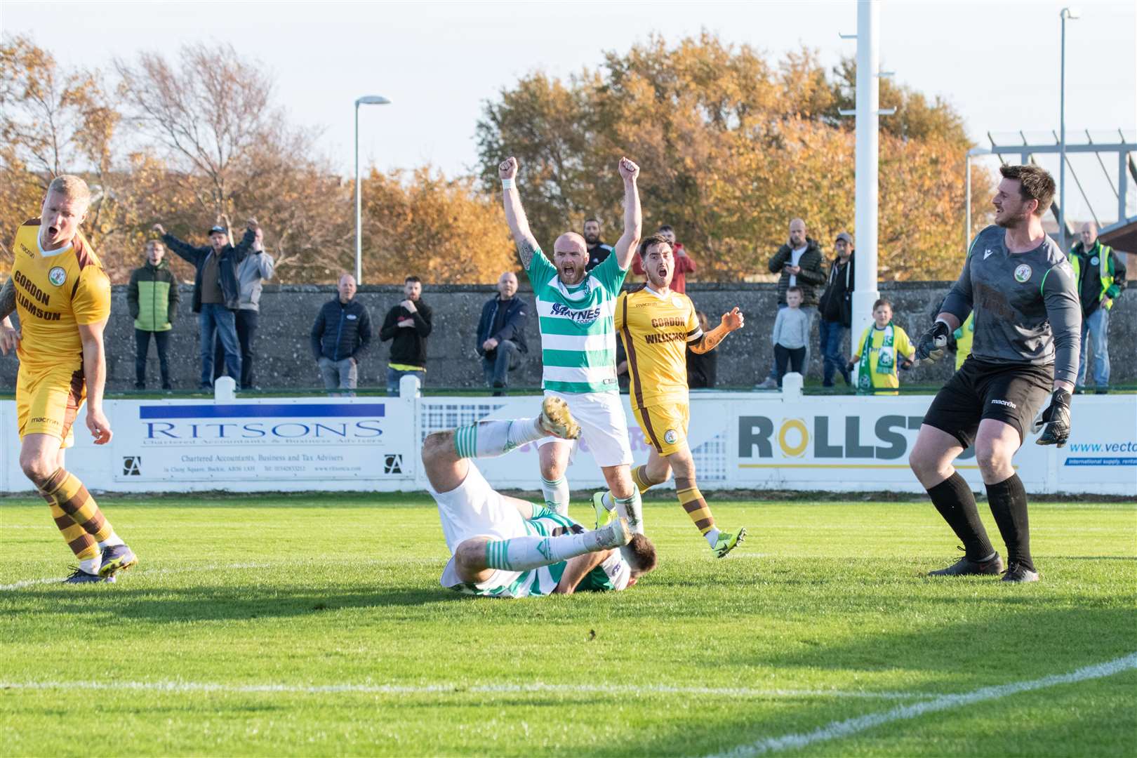 Celebrations after Buckie Thistle's Jack Murray heads home the opening goal for the Jags. ..Buckie Thistle FC (2) vs Forres Mechanics FC (0) - Highland Football League 22/23 - Victoria Park, Buckie 29/10/2022...Picture: Daniel Forsyth..