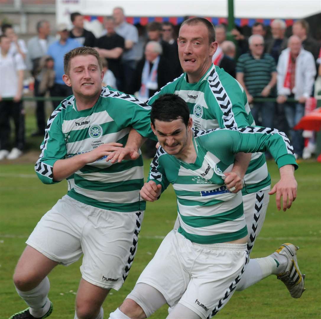 Martin Charlesworth (front) feels the joy of his opening goal for Buckie, joined by David MacRae and Michael Morrison. Photo: Eric Cormack.