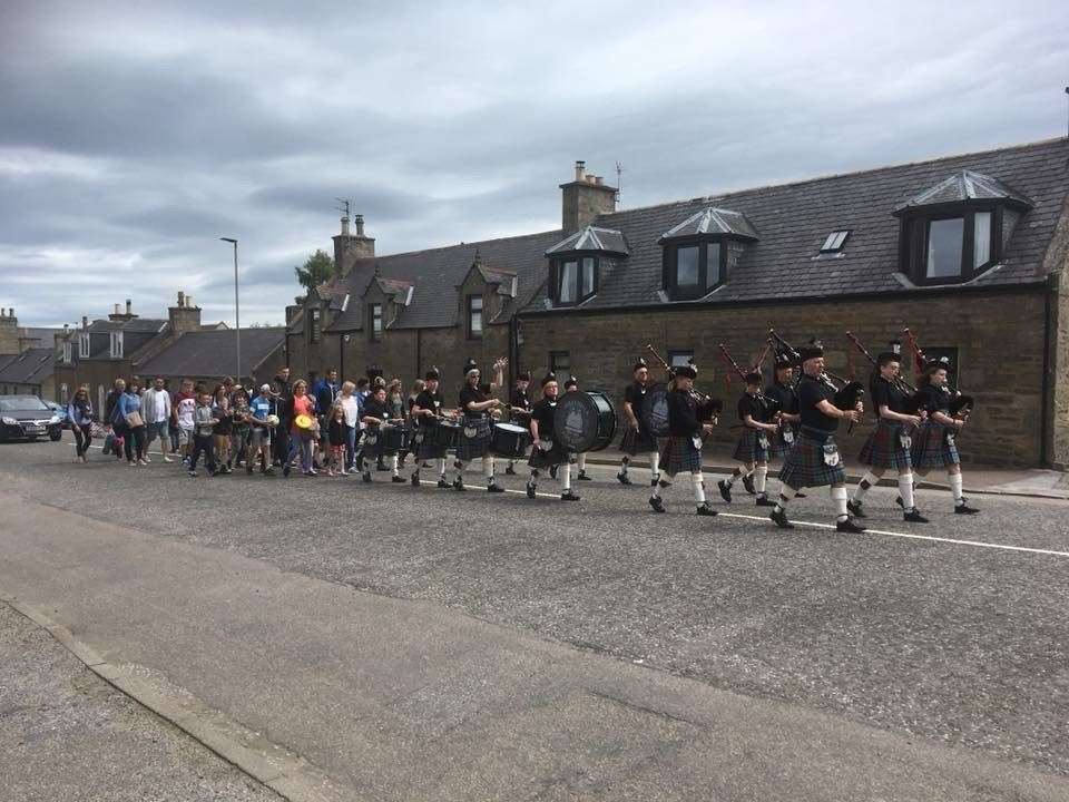 Strathisla Pipe Band on their way to Fife Park.