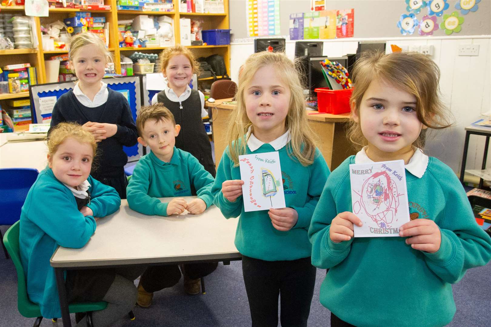 From left; Luna Bowler, Rosie Gordon Duff, Charles Pirie, Keziah Bowler, Erin Irvine and Kaila Briggs...Pupils at Botriphnie Primary School have picked up awards in United Keith's Christmas Card competition...Picture: Daniel Forsyth..