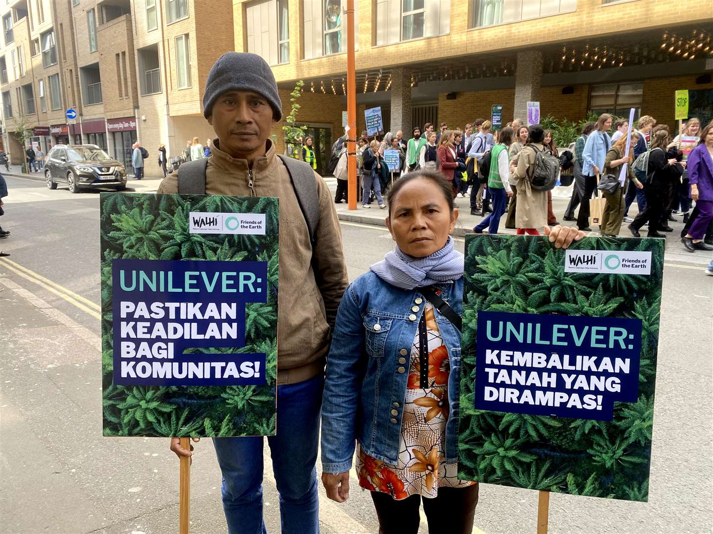 Ketut Sovok and Nengah Wantri outside Unilever’s AGM (PA/Rebecca Speare-Cole)