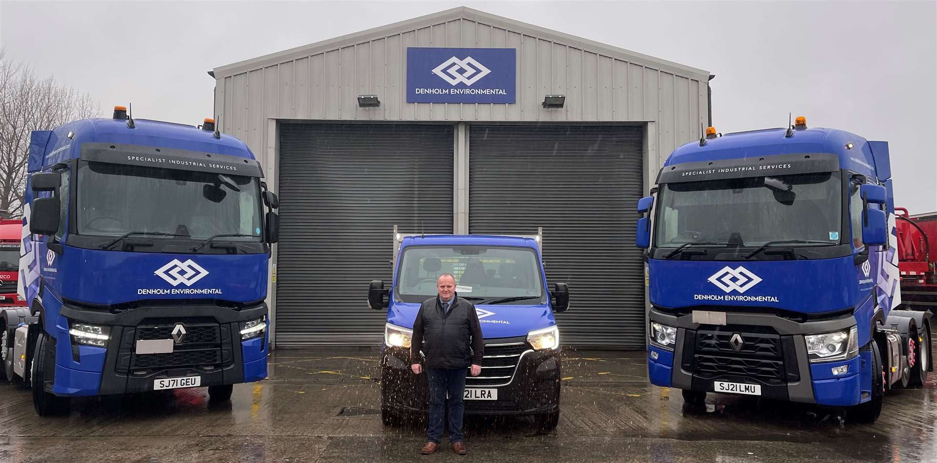 Denholm Environmental managing director Brian Ritchie with some of the company's new fleet.