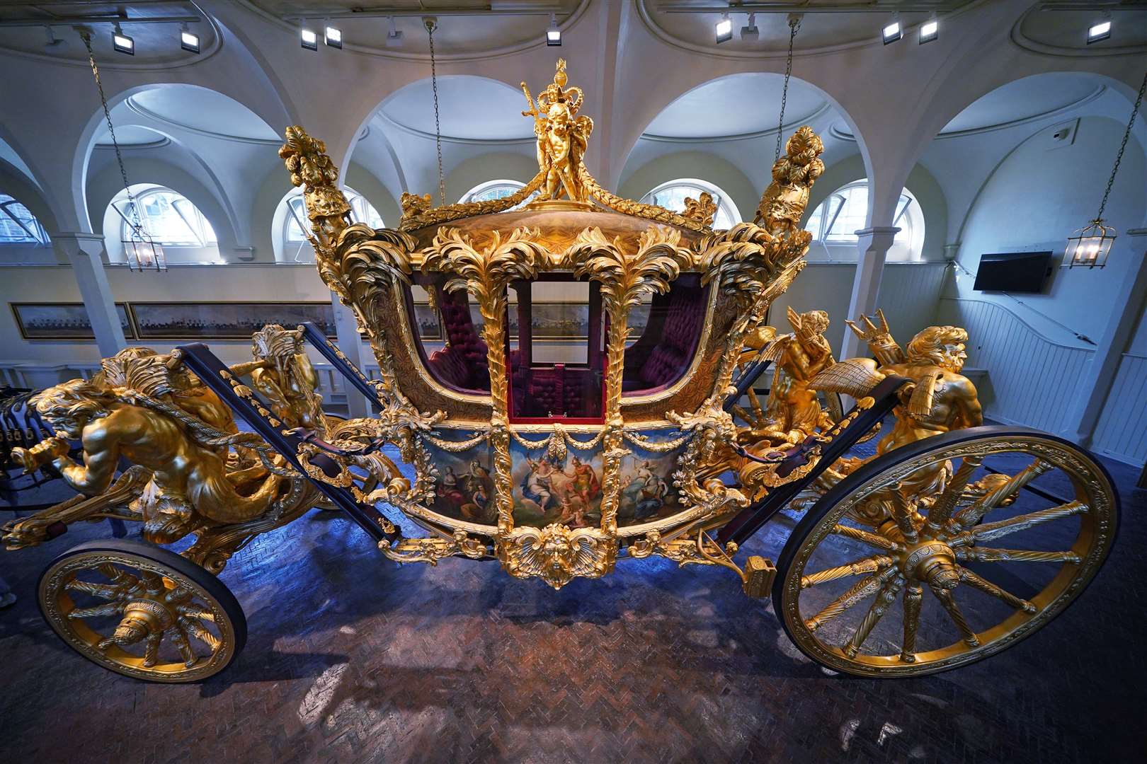 The 260-year-old Gold State Coach will be used only for the King and Camilla’s return procession (Yui Mok/PA)