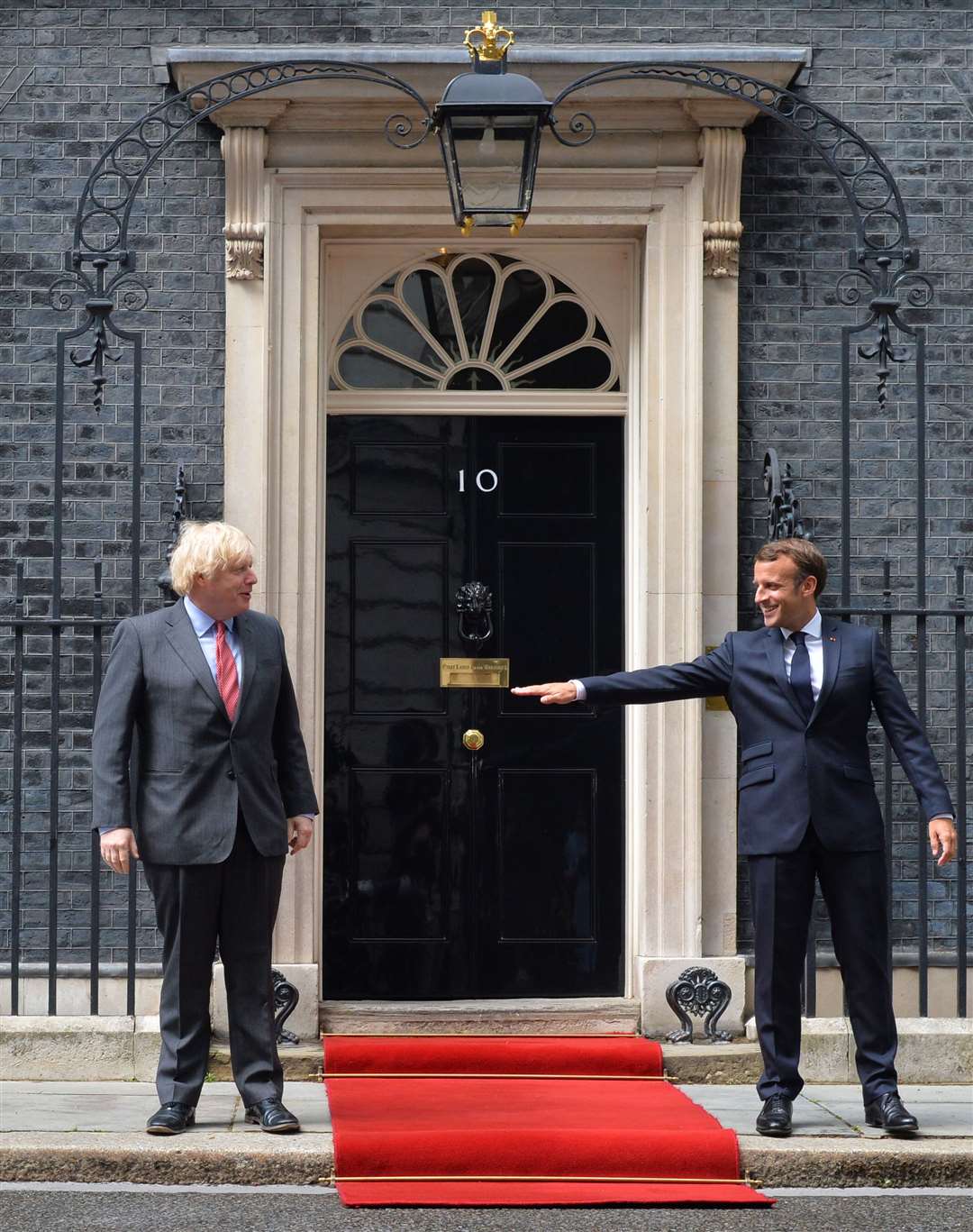 Emmanuel Macron and Boris Johnson keep their distance during the French president’s visit in June (Dominic Lipinski/PA)
