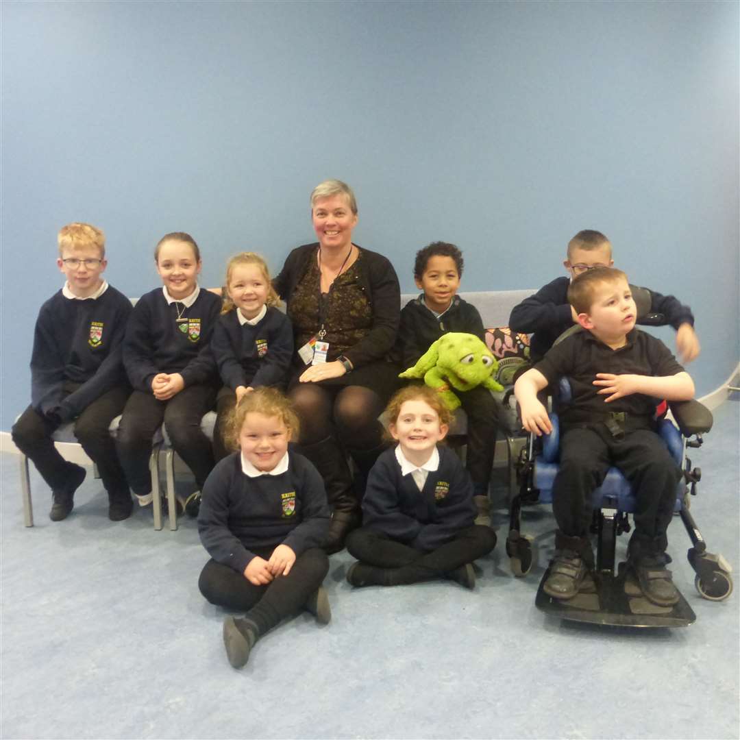 Susan Buchan with pupils from Keith Primary School and the school mascot Keith the Frog.