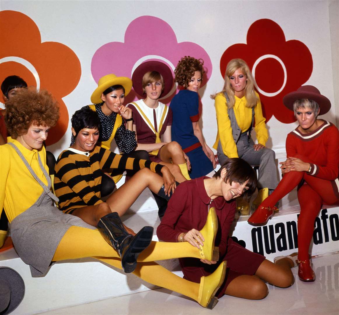 Mary Quant (foreground), with models showing her new shoe creations in 1967 (PA)