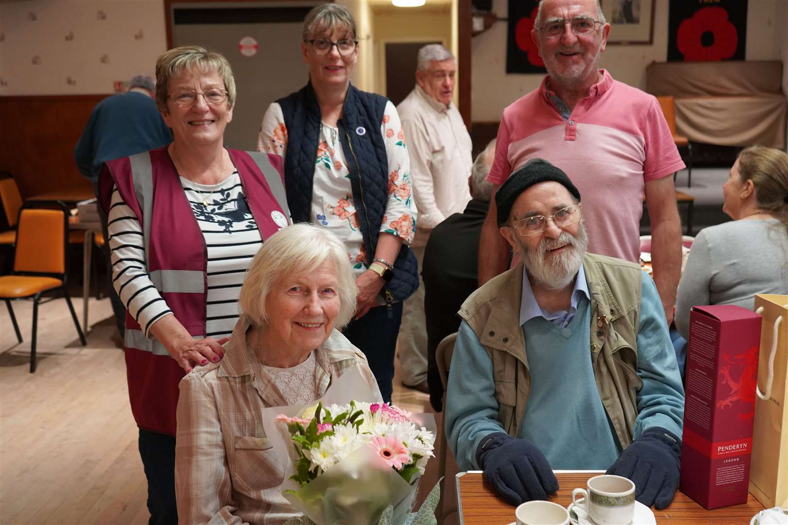 Turriff In Bloom committee members recognised the long service of John Smith and the support of his wife Elizabeth.