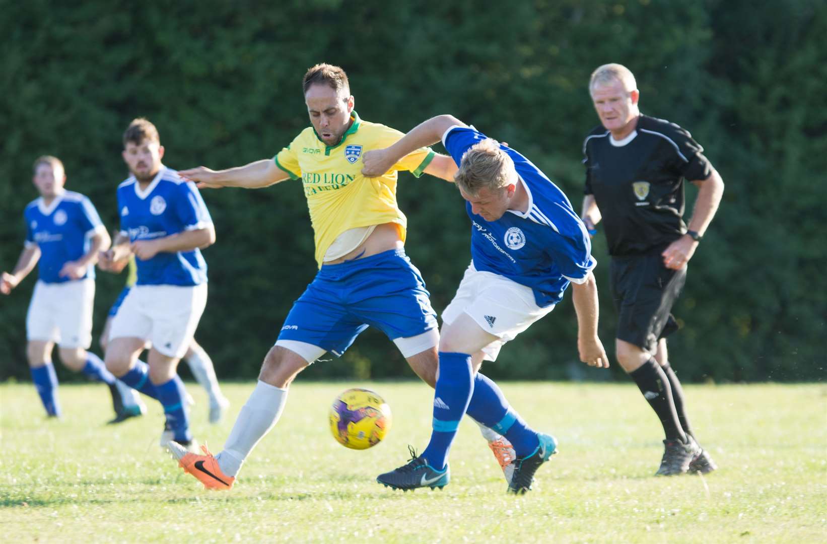 Gary Burchell (left) was on target for FC Fochabers in their win at Aberlour Villa.