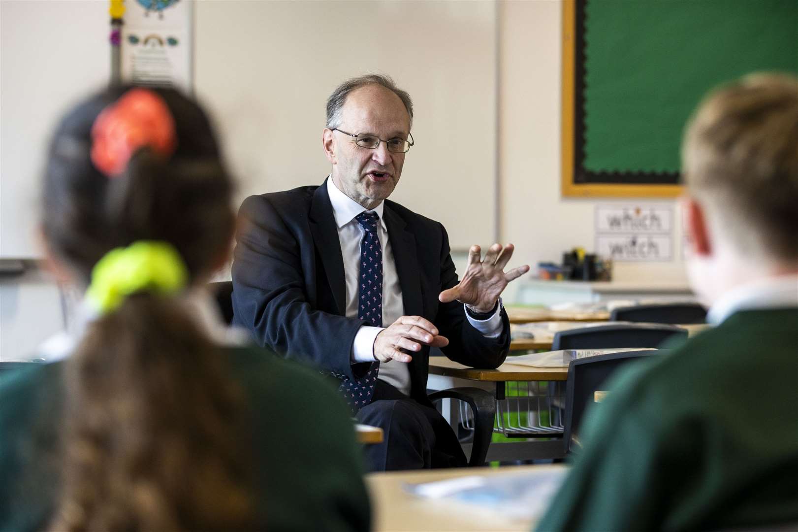 Education minister Peter Weir meets pupils on the student council at St Joesph’s Primary School in Carryduff, Belfast (Liam McBurney/PA)