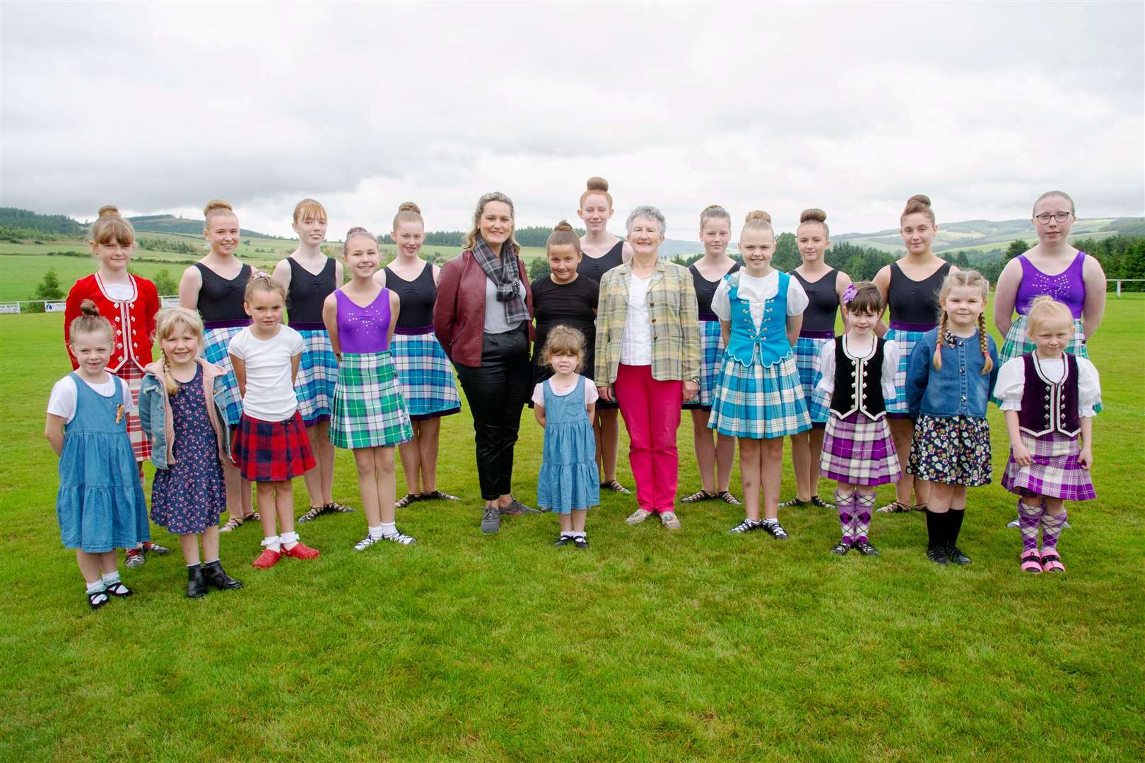 Dance teacher Alison Gordon (Milne), with some of the pupils who joined in her 50th anniversary celebration. Picture: Daniel Forsyth.