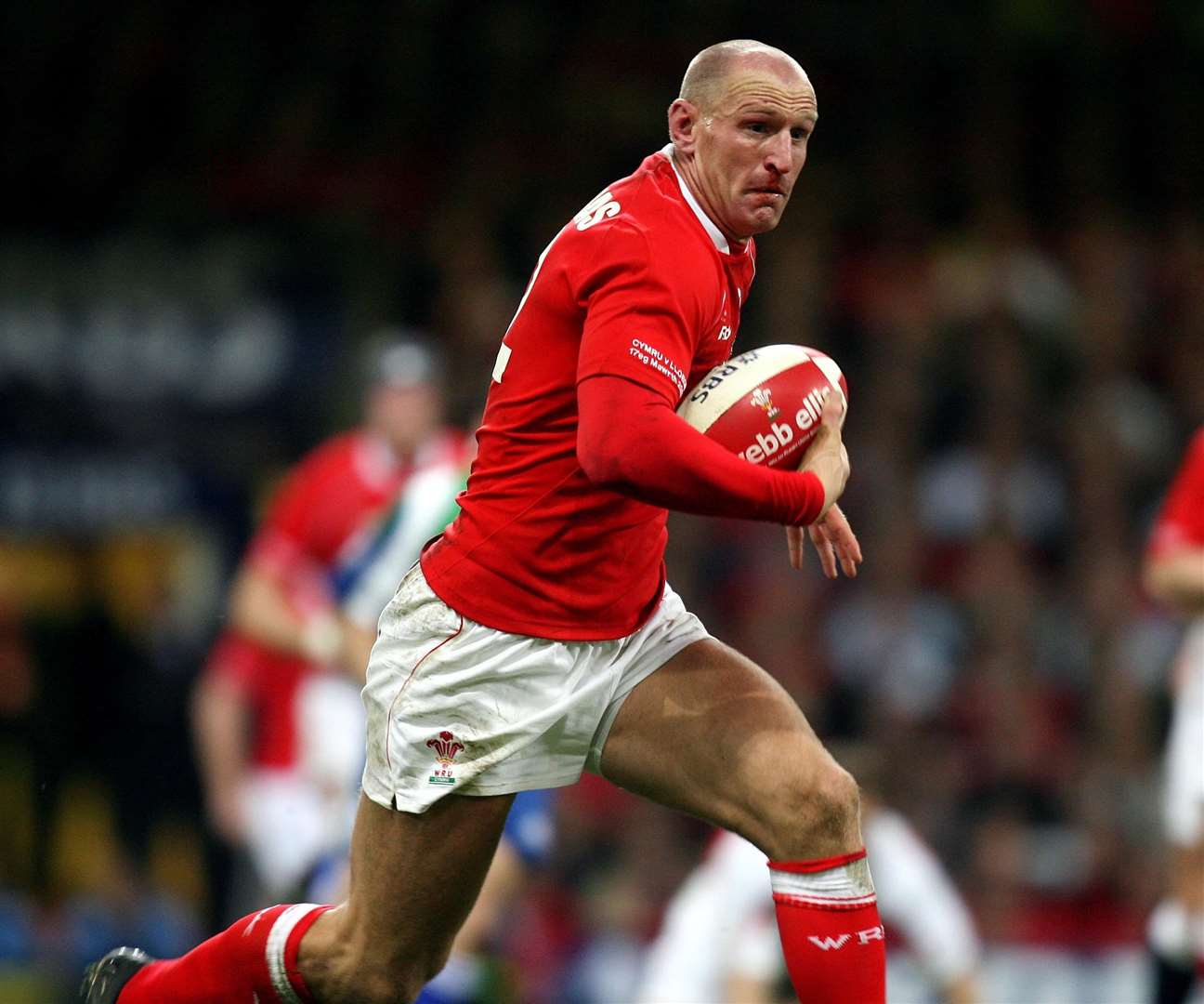 Mr Thomas playing in a Six Nations match at the Millennium Stadium, Cardiff during his career for Wales (PA)