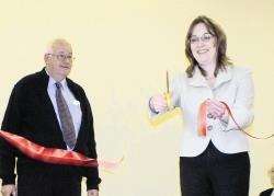 Banff and Buchan MP Dr Eilidh Whiteford cuts the ribbon to officially re-open the refurbished Buchan Street community hall at Macduff. (IR)