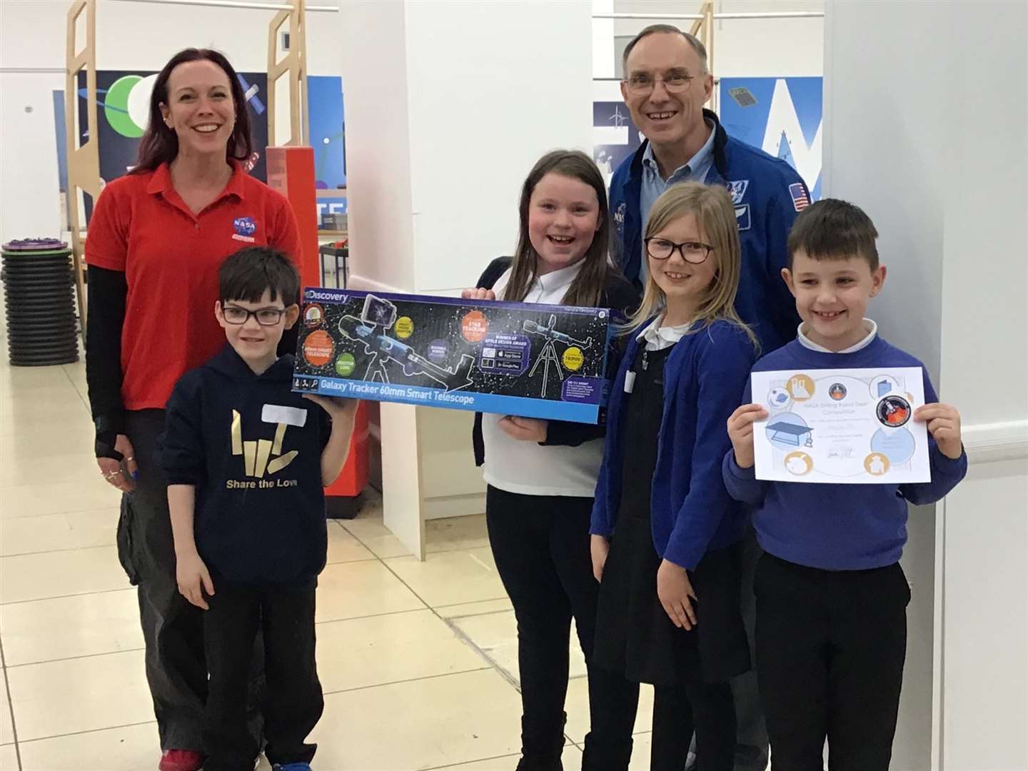The winning Shooting Stars team from Macduff Primary School with Nasa astronaut Carl Walz and engineer Heather Paul.