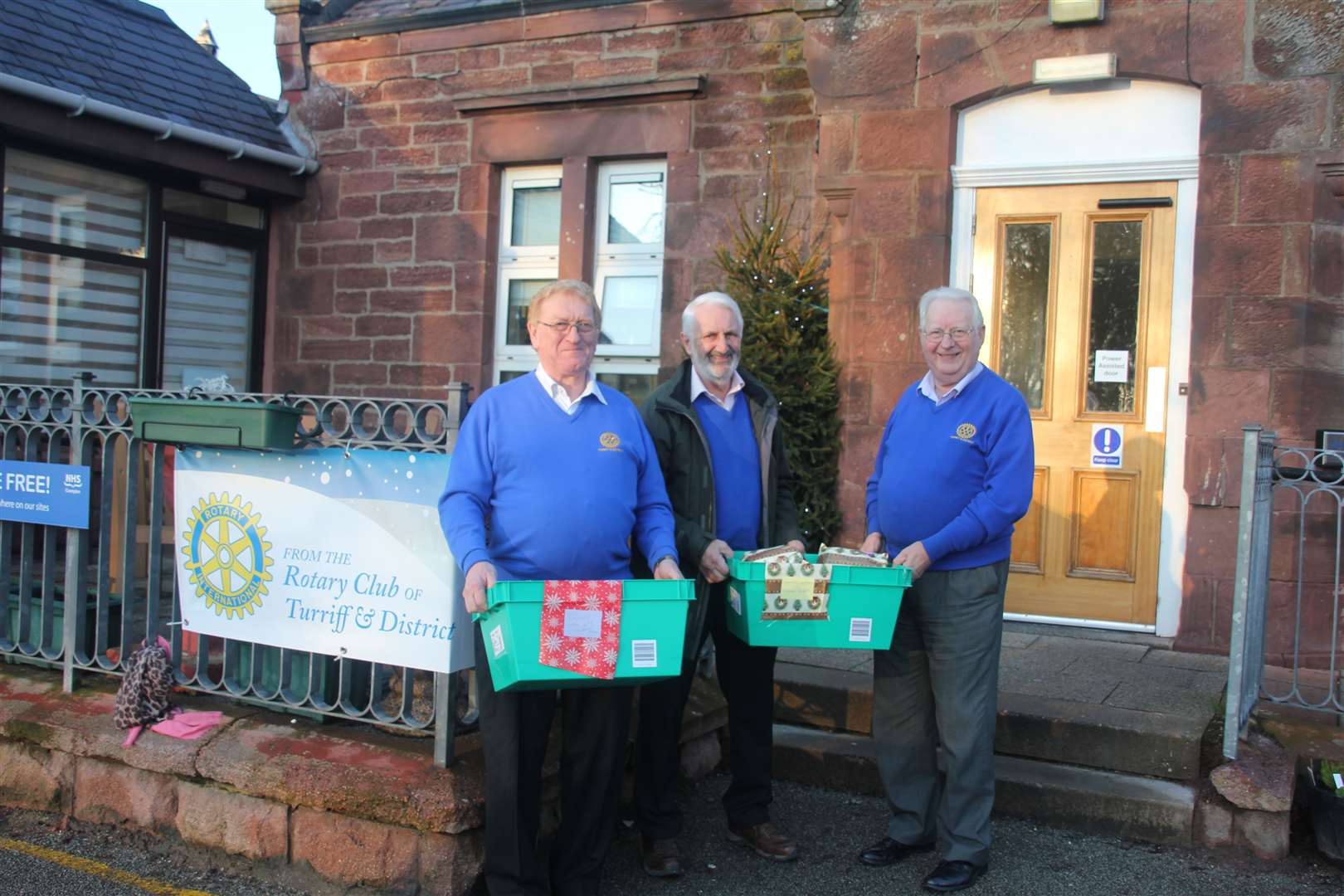 Rotary club members Iain Matthews, Robert Pirie and Charlie Laing visited the hospital to distribute parcels. Picture: Kirsty Brown