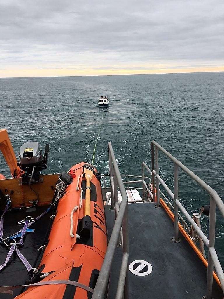 Buckie’s RNLB William Blannin tows the 18ft casualty vessel to harbour.