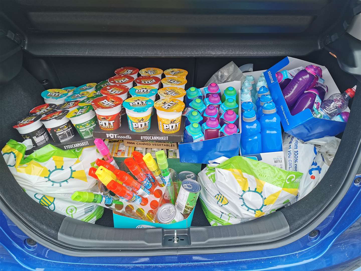 George Mackie took a full boot of goods to the food bank.