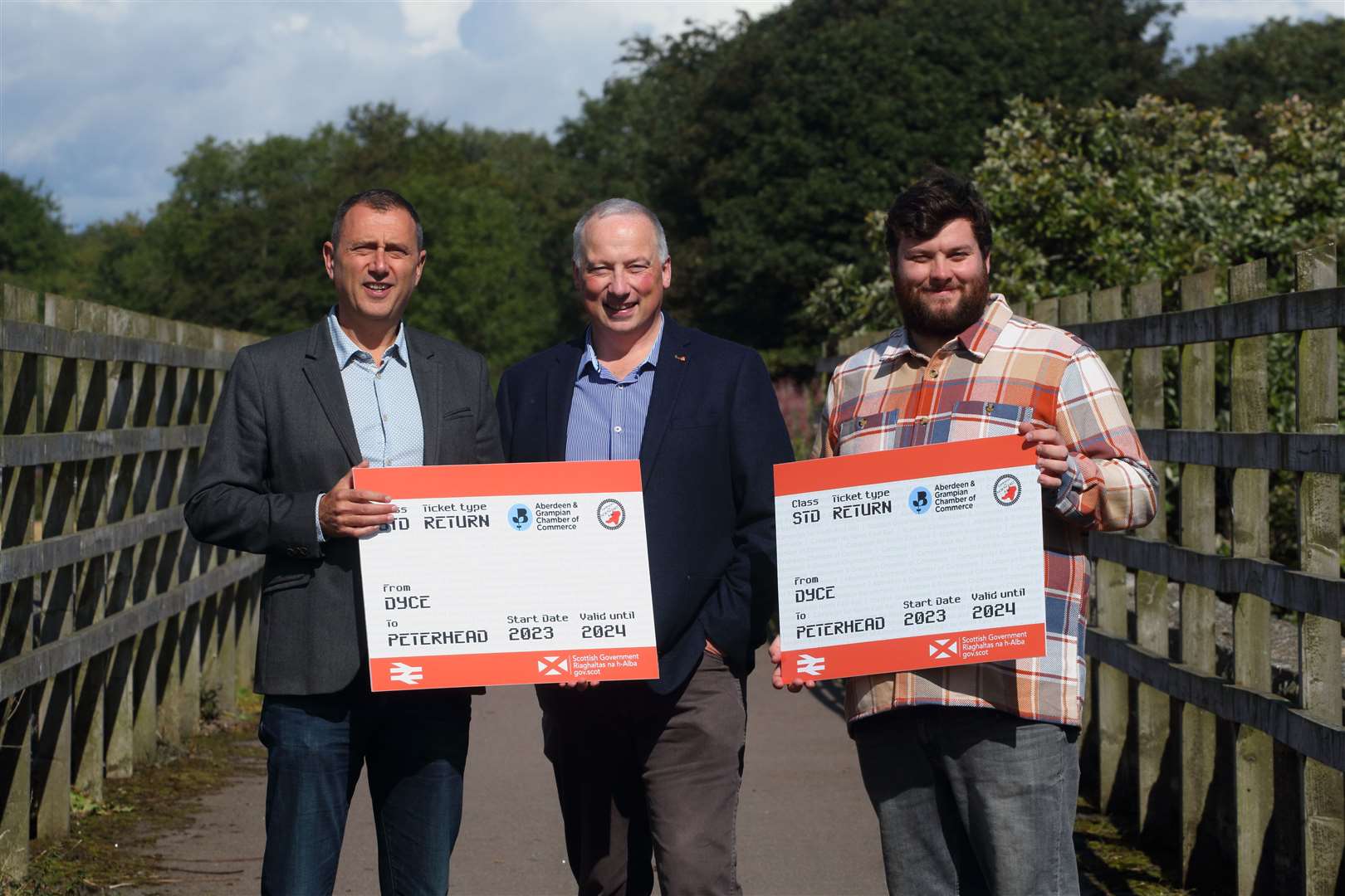 Chief Executive of Aberdeen & Grampian Chamber of Commerc Russell Borthwick,(left) with Campaign for North East Rail's Craig Leuchar and Jordan Jack. Picture: David Porter