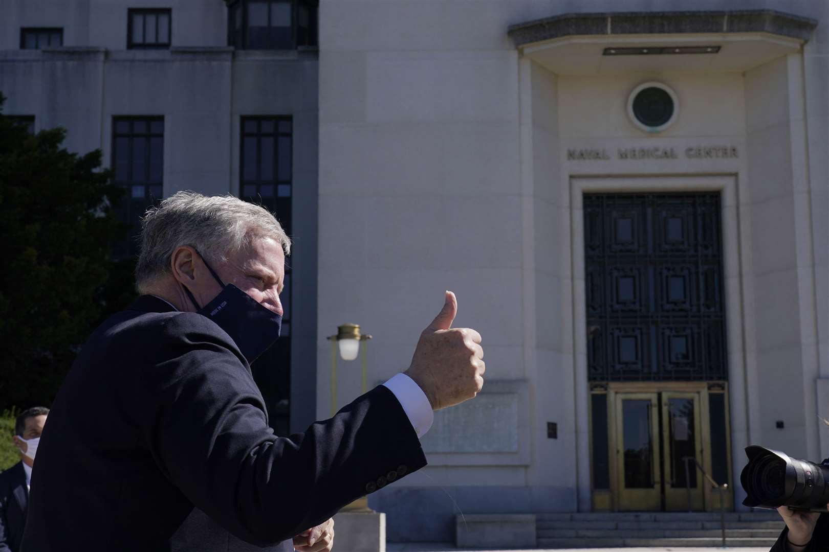 White House Chief of Staff Mark Meadows gives a thumbs up following a medical briefing with reporters at Walter Reed National Military Medical Centre (Susan Walsh/AP)