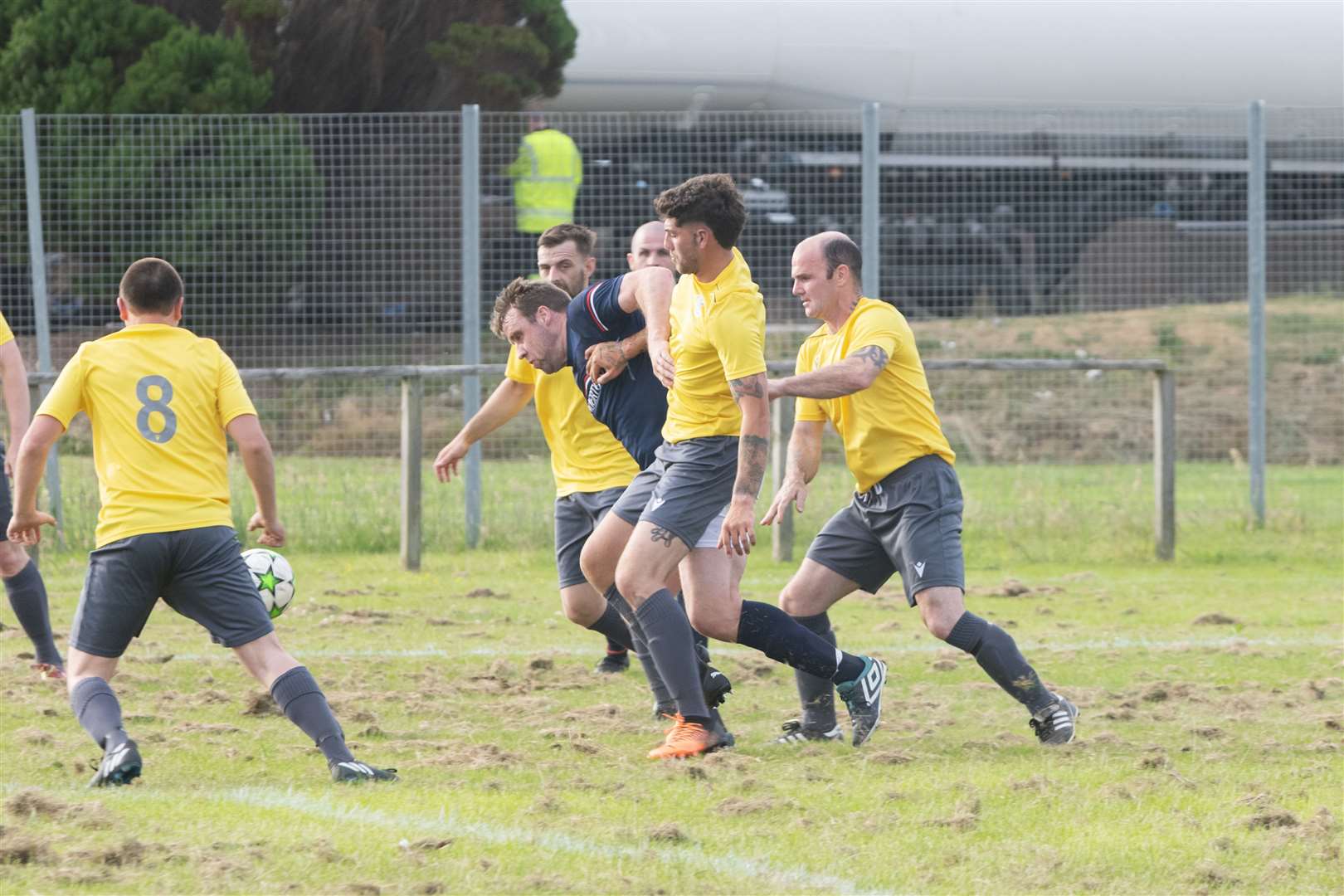 Kevin Fairweather (centre) scored a Thunderton wonder goal in his team's shock win over RAF Lossie. Picture: Beth Taylor.