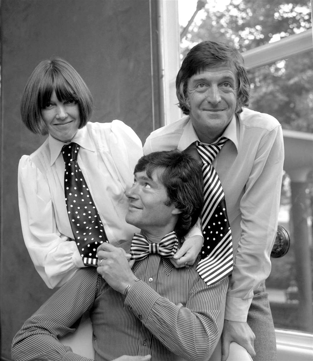 Sir Michael joined fashion designer Mary Quant and hair stylist Vidal Sassoon (centre), to show off some of her latest venture, neckwear for men (PA)